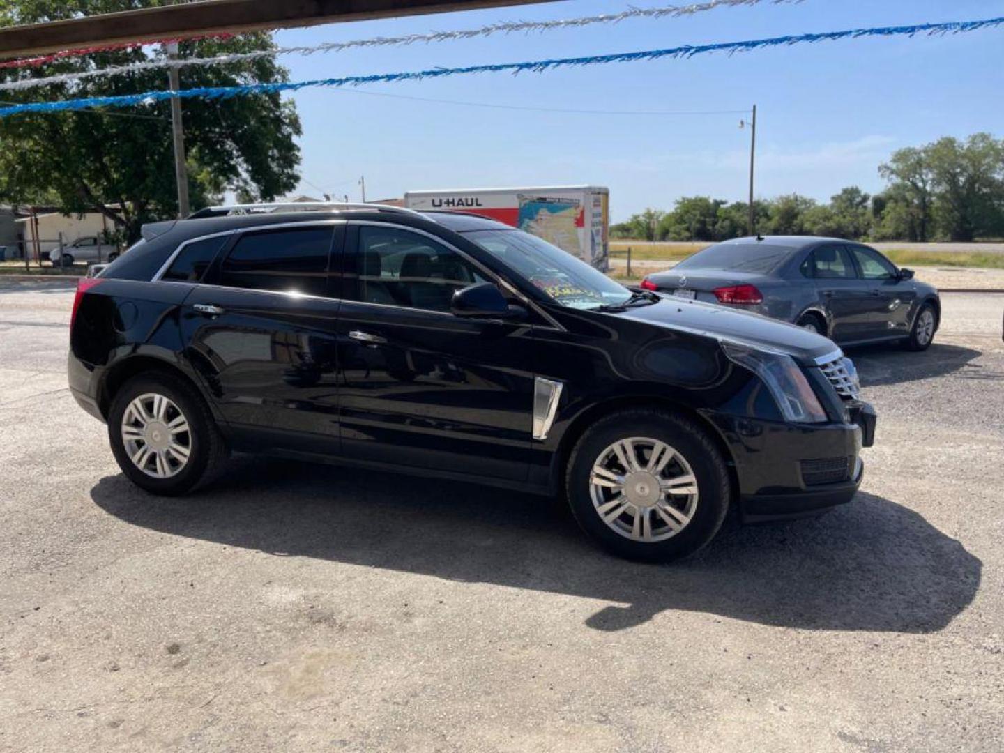 2015 BLACK CADILLAC SRX LUXURY COLLECTION (3GYFNBE35FS) with an 3.6L engine, Automatic transmission, located at 124 Elm St., Cibolo, TX, 78108, (210) 658-3118, 29.559427, -98.232384 - Photo#10