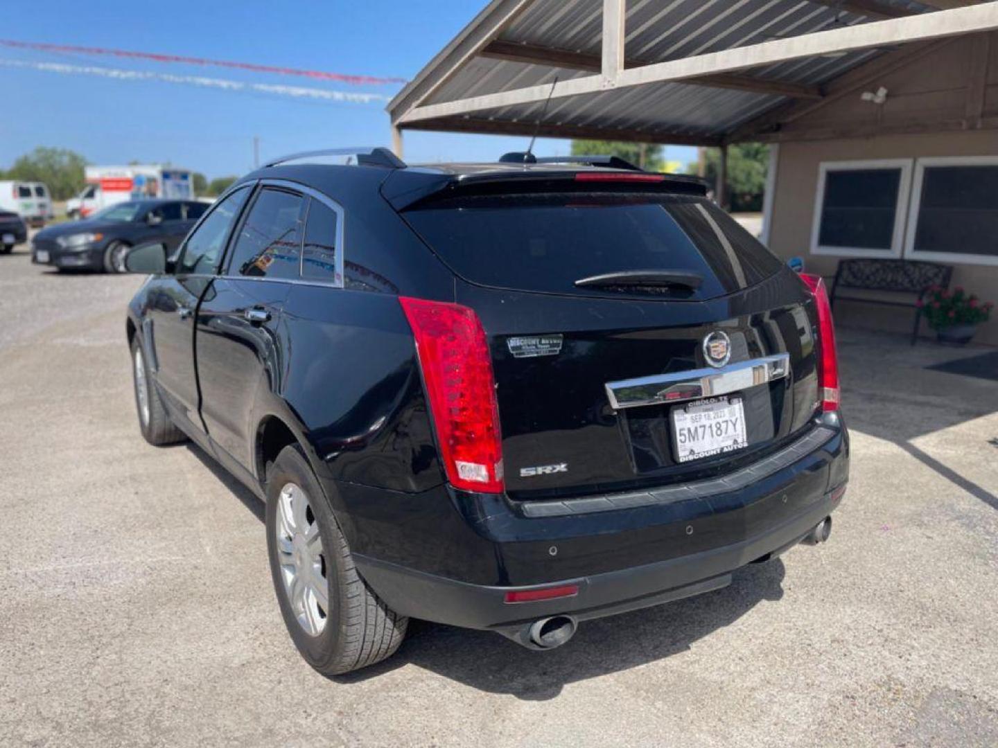 2015 BLACK CADILLAC SRX LUXURY COLLECTION (3GYFNBE35FS) with an 3.6L engine, Automatic transmission, located at 124 Elm St., Cibolo, TX, 78108, (210) 658-3118, 29.559427, -98.232384 - Photo#3