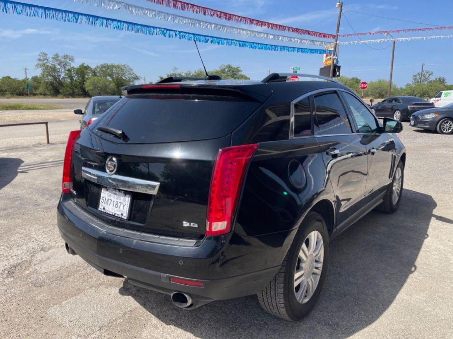 2015 BLACK CADILLAC SRX LUXURY COLLECTION (3GYFNBE35FS) with an 3.6L engine, Automatic transmission, located at 124 Elm St., Cibolo, TX, 78108, (210) 658-3118, 29.559427, -98.232384 - Photo#4