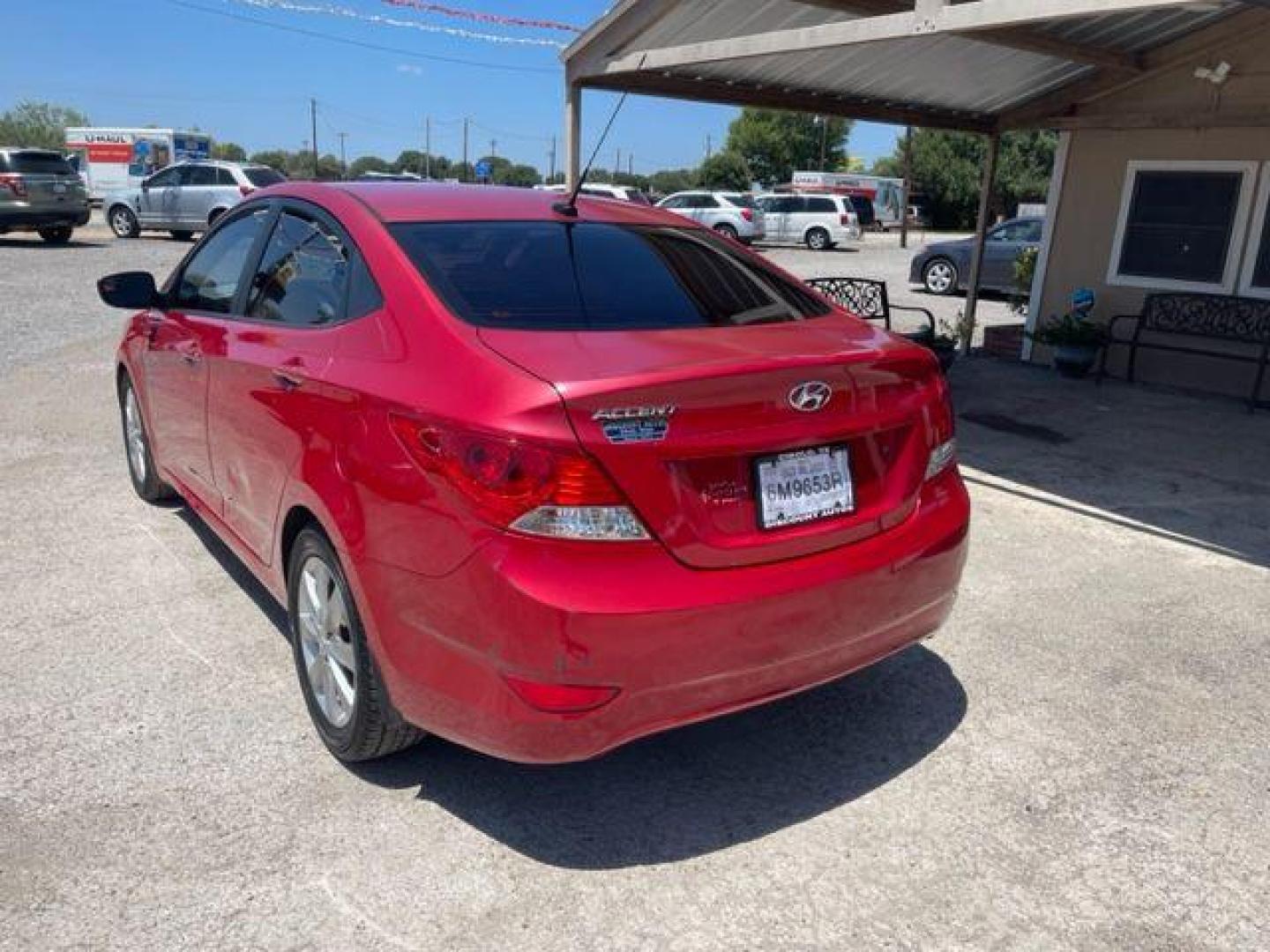 2014 RED HYUNDAI ACCENT GLS (KMHCU4AE8EU) with an 1.6L engine, Automatic transmission, located at 124 Elm St., Cibolo, TX, 78108, (210) 658-3118, 29.559427, -98.232384 - Photo#1