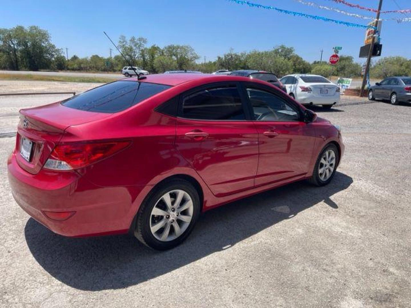 2014 RED HYUNDAI ACCENT GLS (KMHCU4AE8EU) with an 1.6L engine, Automatic transmission, located at 124 Elm St., Cibolo, TX, 78108, (210) 658-3118, 29.559427, -98.232384 - Photo#2