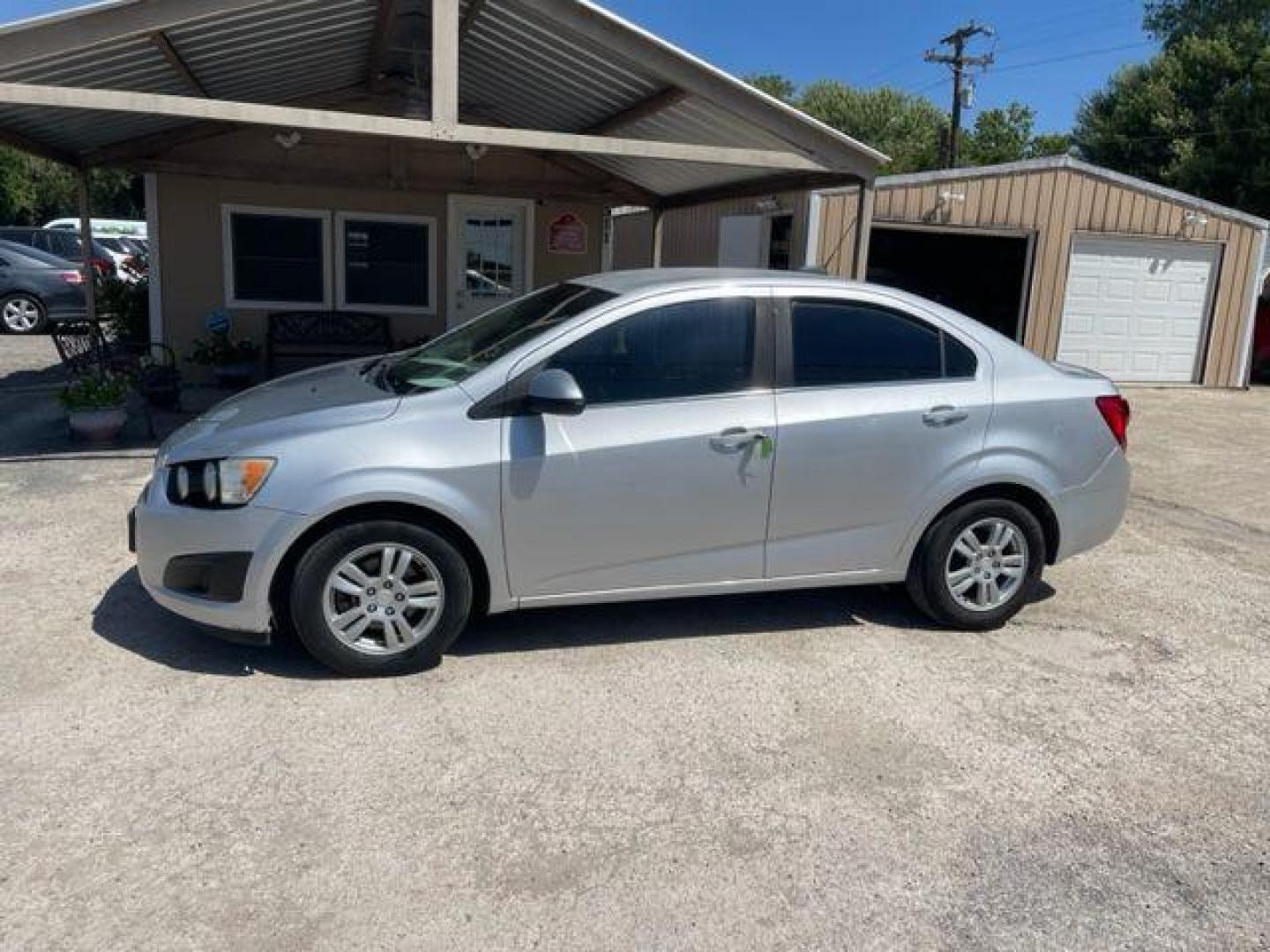 2015 SILVER CHEVROLET SONIC LT (1G1JC5SH6F4) with an 1.8L engine, Automatic transmission, located at 124 Elm St., Cibolo, TX, 78108, (210) 658-3118, 29.559427, -98.232384 - www.discountautoscibolo.com TEXT QUESTIONS TO 210-900-3118 35 MONTHLY PAYMENTS OF $295 WITH $1895 DOWN AND FINAL ODD PAYMENT OF $280.14 W/FIRST PAYMENT DUE 30 DAYS FROM DATE OF SALE. WARRANTY ON ENGINE and TRANSMISSION ONLY FOR 3 MONTHS OR 3,000 MLS. 36 MO'S TERM W/ 22.44 - Photo#0