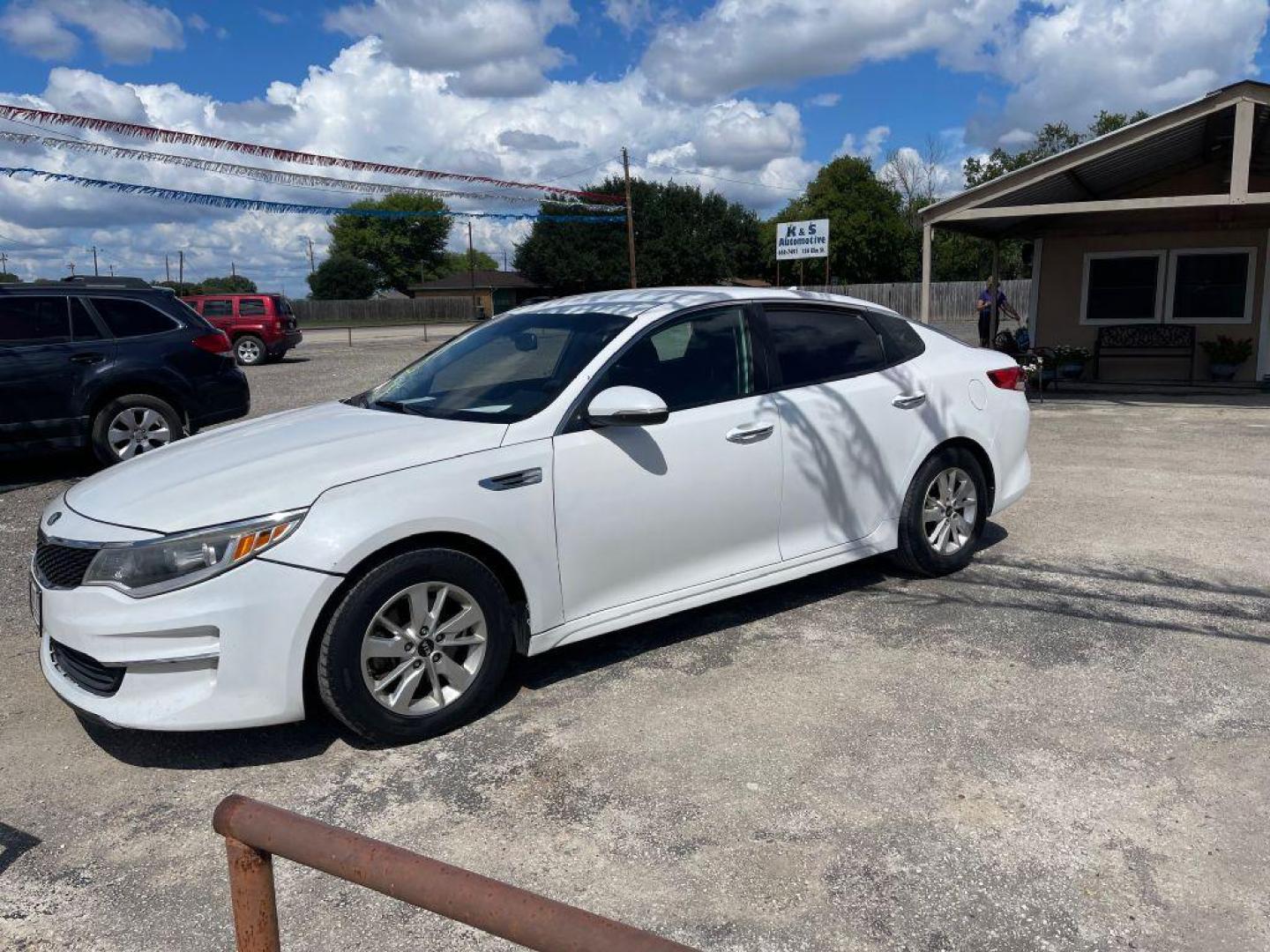 2016 WHITE KIA OPTIMA LX (5XXGT4L33GG) with an 2.4L engine, Automatic transmission, located at 124 Elm St., Cibolo, TX, 78108, (210) 658-3118, 29.559427, -98.232384 - www.discountautoscibolo.com TEXT QUESTIONS TO 210-900-3118 35 MONTHLY PAYMENTS OF $300 WITH $2295 DOWN AND FINAL ODD PAYMENT OF $214.30 W/FIRST PAYMENT DUE 30 DAYS FROM DATE OF SALE. ** NO WARRANTY, SOLD AS IS ** 36 MO'S TERM W/ 22.32 APR and TITLE TRANSFER FEE OF $245 DUE - Photo#0