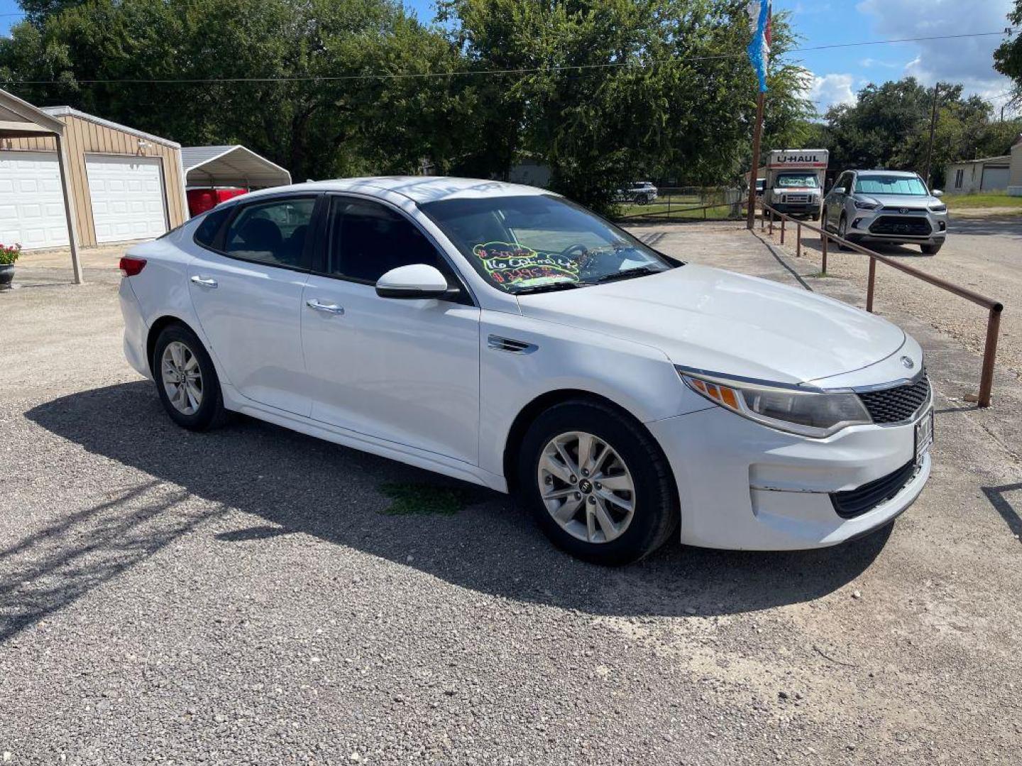 2016 WHITE KIA OPTIMA LX (5XXGT4L33GG) with an 2.4L engine, Automatic transmission, located at 124 Elm St., Cibolo, TX, 78108, (210) 658-3118, 29.559427, -98.232384 - www.discountautoscibolo.com TEXT QUESTIONS TO 210-900-3118 35 MONTHLY PAYMENTS OF $300 WITH $2295 DOWN AND FINAL ODD PAYMENT OF $214.30 W/FIRST PAYMENT DUE 30 DAYS FROM DATE OF SALE. ** NO WARRANTY, SOLD AS IS ** 36 MO'S TERM W/ 22.32 APR and TITLE TRANSFER FEE OF $245 DUE - Photo#6