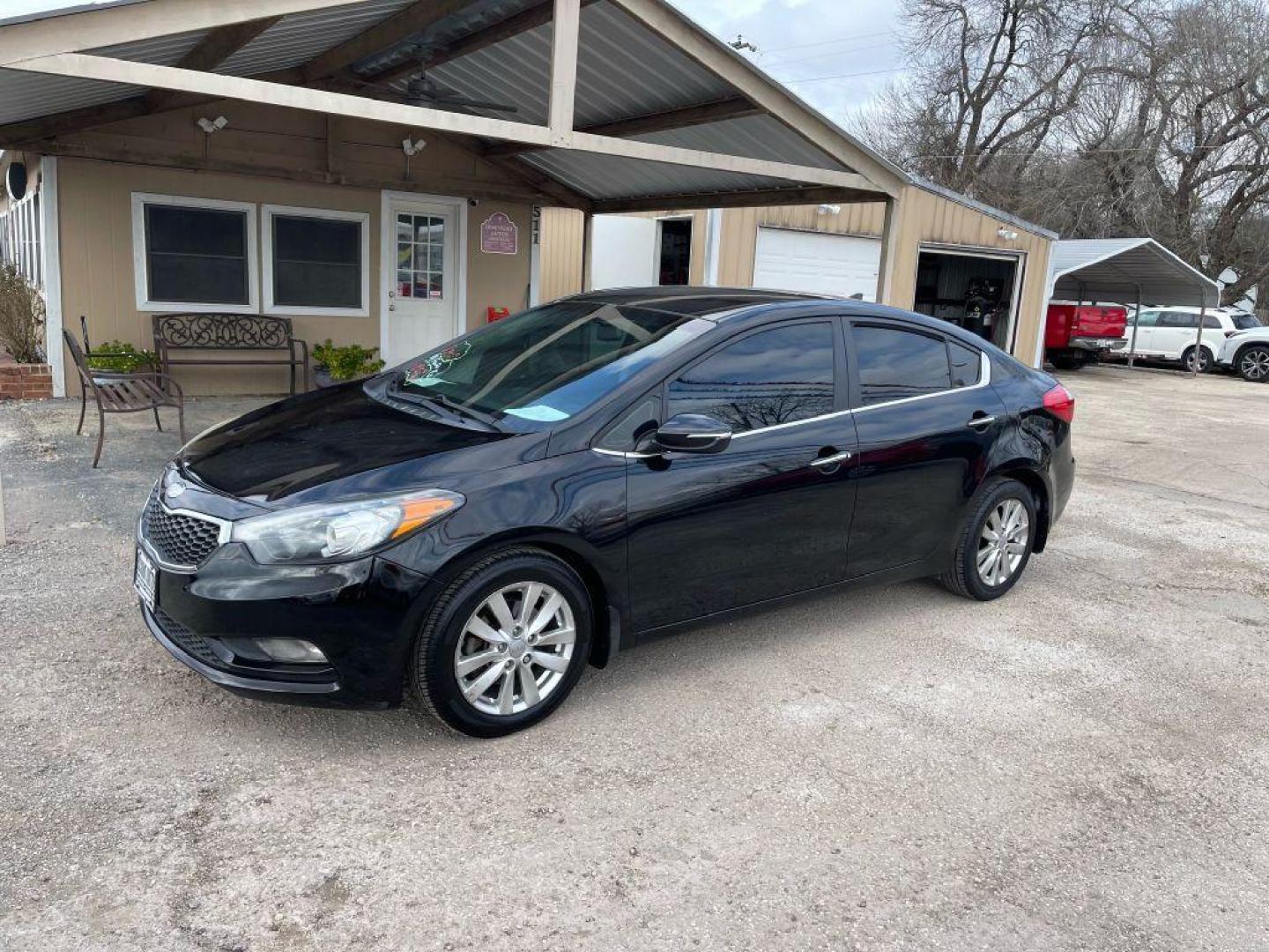 2014 BLACK KIA FORTE EX (KNAFX4A89E5) with an 2.0L engine, Automatic transmission, located at 124 Elm St., Cibolo, TX, 78108, (210) 658-3118, 29.559427, -98.232384 - Photo#0