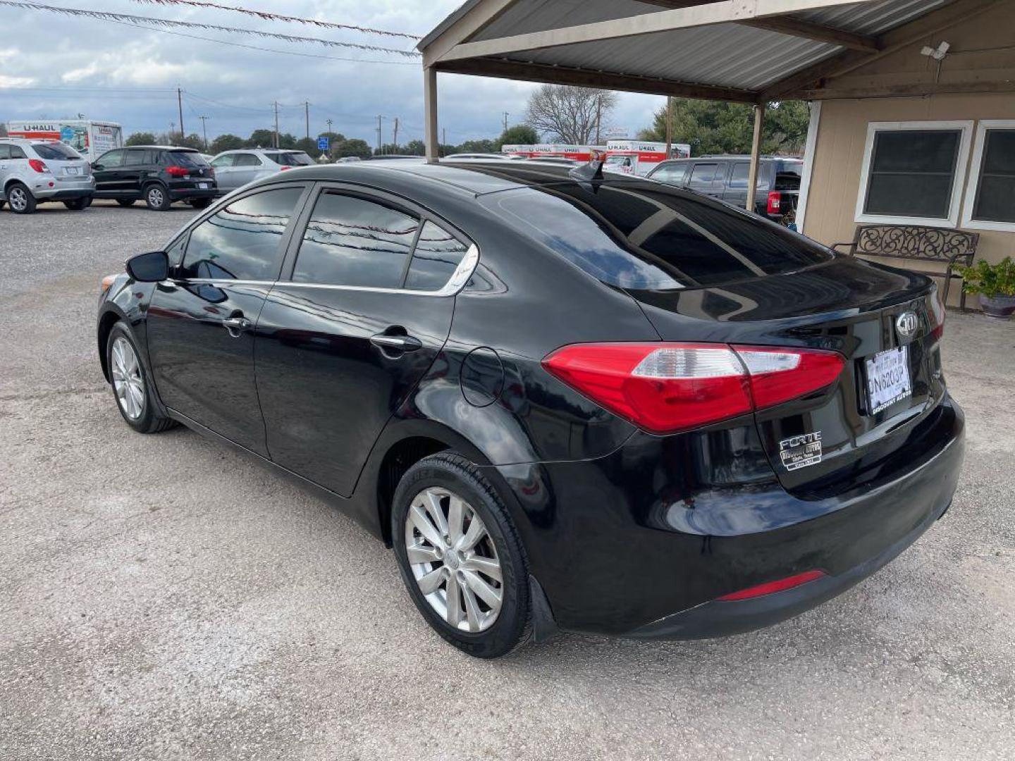 2014 BLACK KIA FORTE EX (KNAFX4A89E5) with an 2.0L engine, Automatic transmission, located at 124 Elm St., Cibolo, TX, 78108, (210) 658-3118, 29.559427, -98.232384 - Photo#3