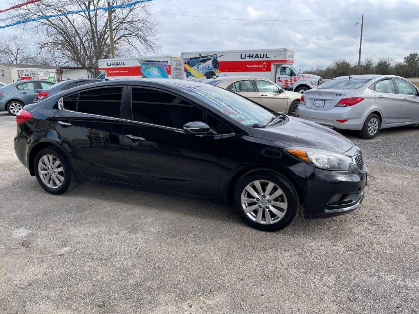 2014 BLACK KIA FORTE EX (KNAFX4A89E5) with an 2.0L engine, Automatic transmission, located at 124 Elm St., Cibolo, TX, 78108, (210) 658-3118, 29.559427, -98.232384 - Photo#7