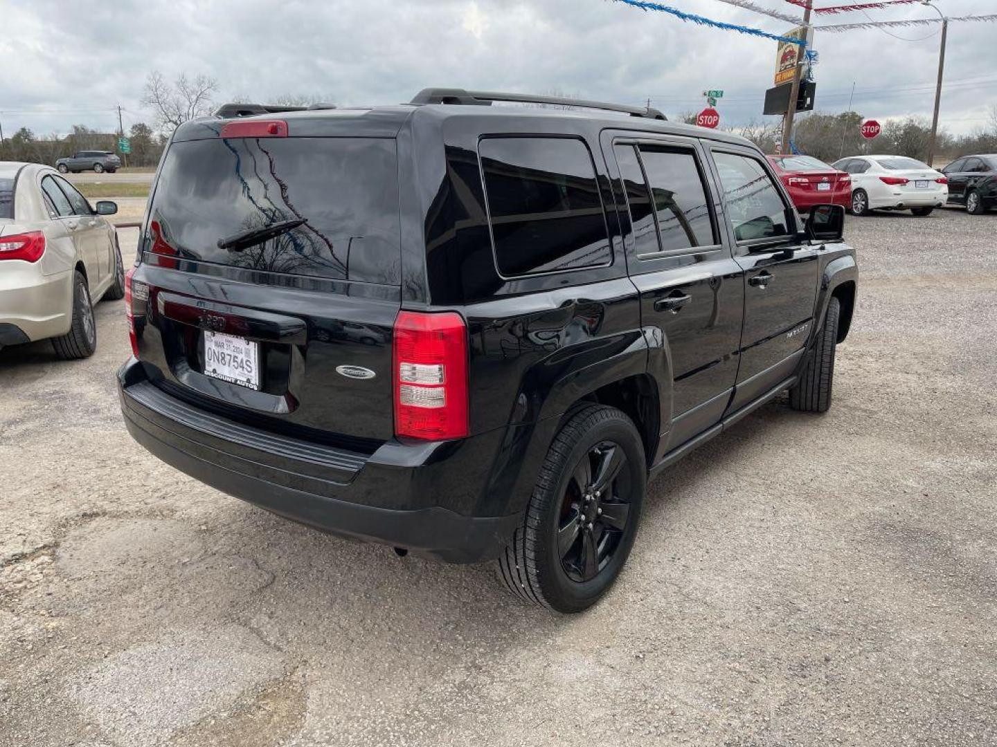 2015 BLACK JEEP PATRIOT ALTITUDE (1C4NJPBA2FD) with an 2.0L engine, Continuously Variable transmission, located at 124 Elm St., Cibolo, TX, 78108, (210) 658-3118, 29.559427, -98.232384 - Photo#4