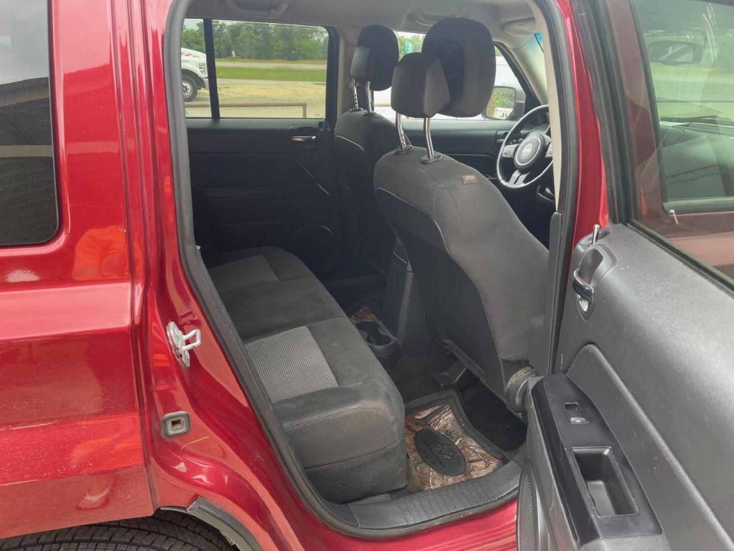 2016 MAROON JEEP PATRIOT LATITUDE (1C4NJPFB0GD) with an 2.4L engine, Continuously Variable transmission, located at 124 Elm St., Cibolo, TX, 78108, (210) 658-3118, 29.559427, -98.232384 - Photo#5