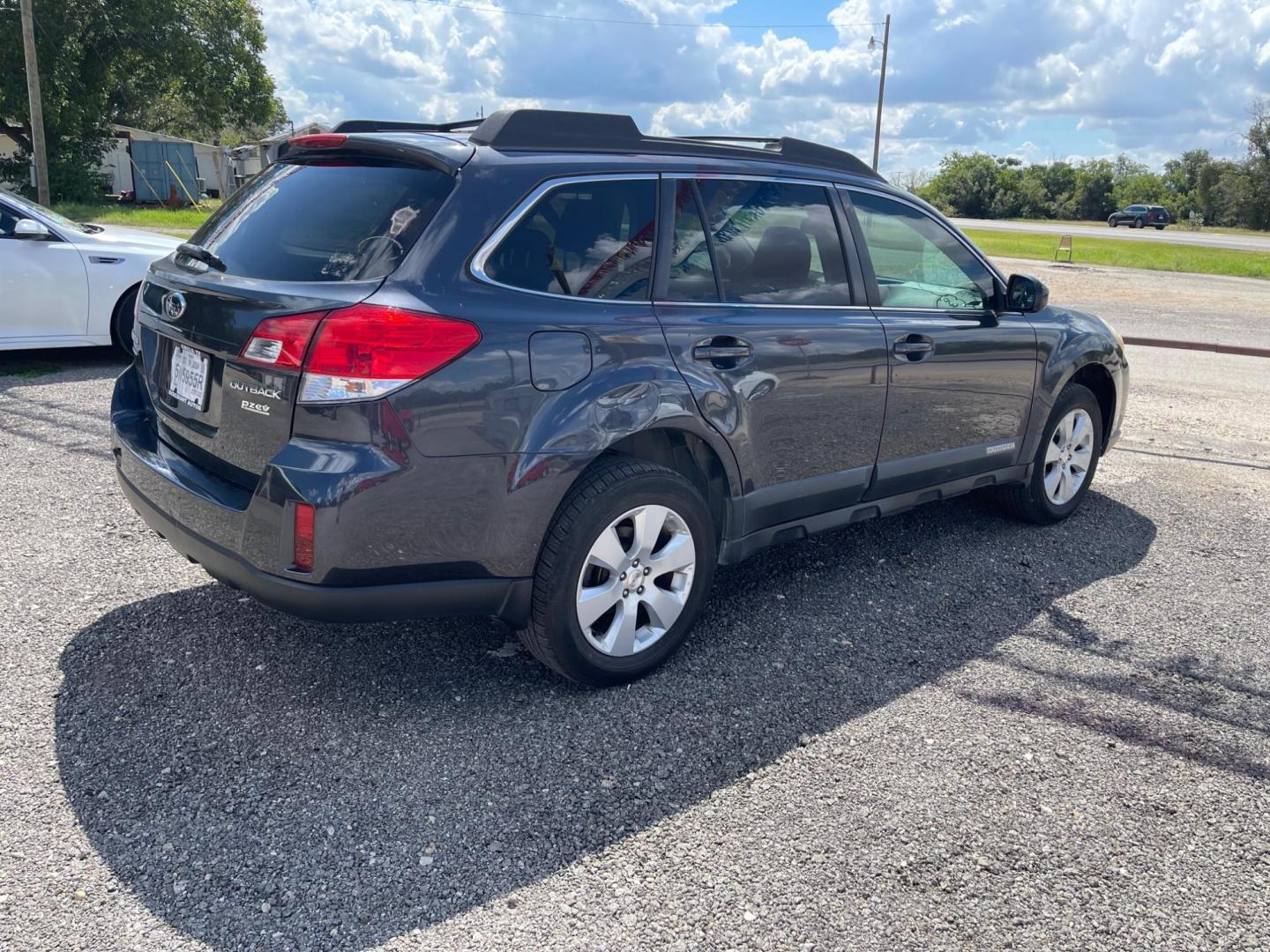 2012 BLUE SUBARU OUTBACK 2.5I PREMIUM (4S4BRBCCXC1) with an 2.5L engine, 5-Speed Manual transmission, located at 124 Elm St., Cibolo, TX, 78108, (210) 658-3118, 29.559427, -98.232384 - www.discountautoscibolo.com TEXT QUESTIONS TO 210-900-3118 35 MONTHLY PAYMENTS OF $295 WITH $1495 DOWN AND FINAL ODD PAYMENT OF $64.18 W/FIRST PAYMENT DUE 30 DAYS FROM DATE OF SALE. ** NO WARRANTY, SOLD AS IS ** 36 MO'S TERM W/ 22.41 APR and TITLE TRANSFER FEE OF $195 DUE - Photo#3