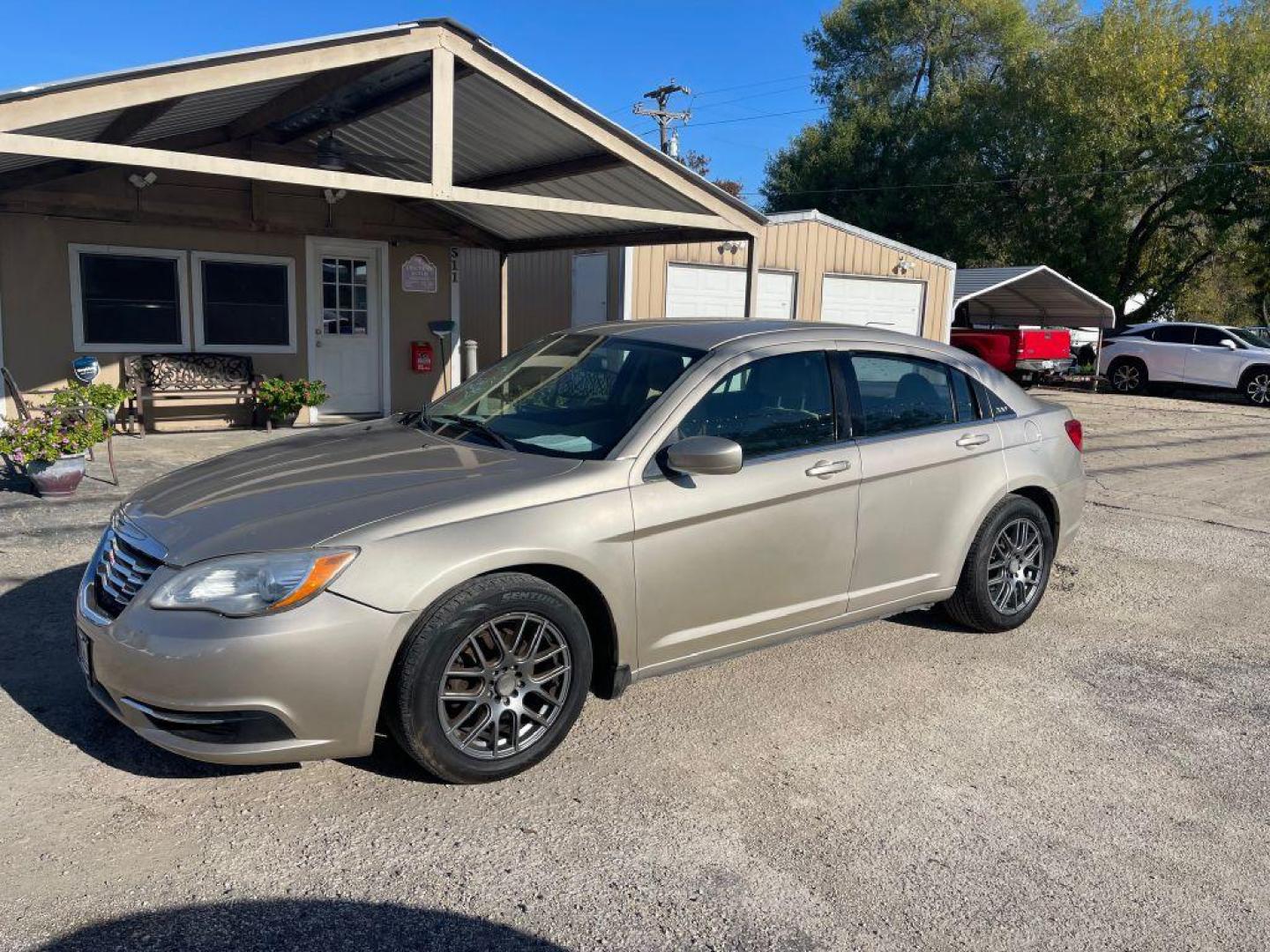 2014 GOLD CHRYSLER 200 LX (1C3CCBAG1EN) with an 3.6L engine, Automatic transmission, located at 124 Elm St., Cibolo, TX, 78108, (210) 658-3118, 29.559427, -98.232384 - Photo#0