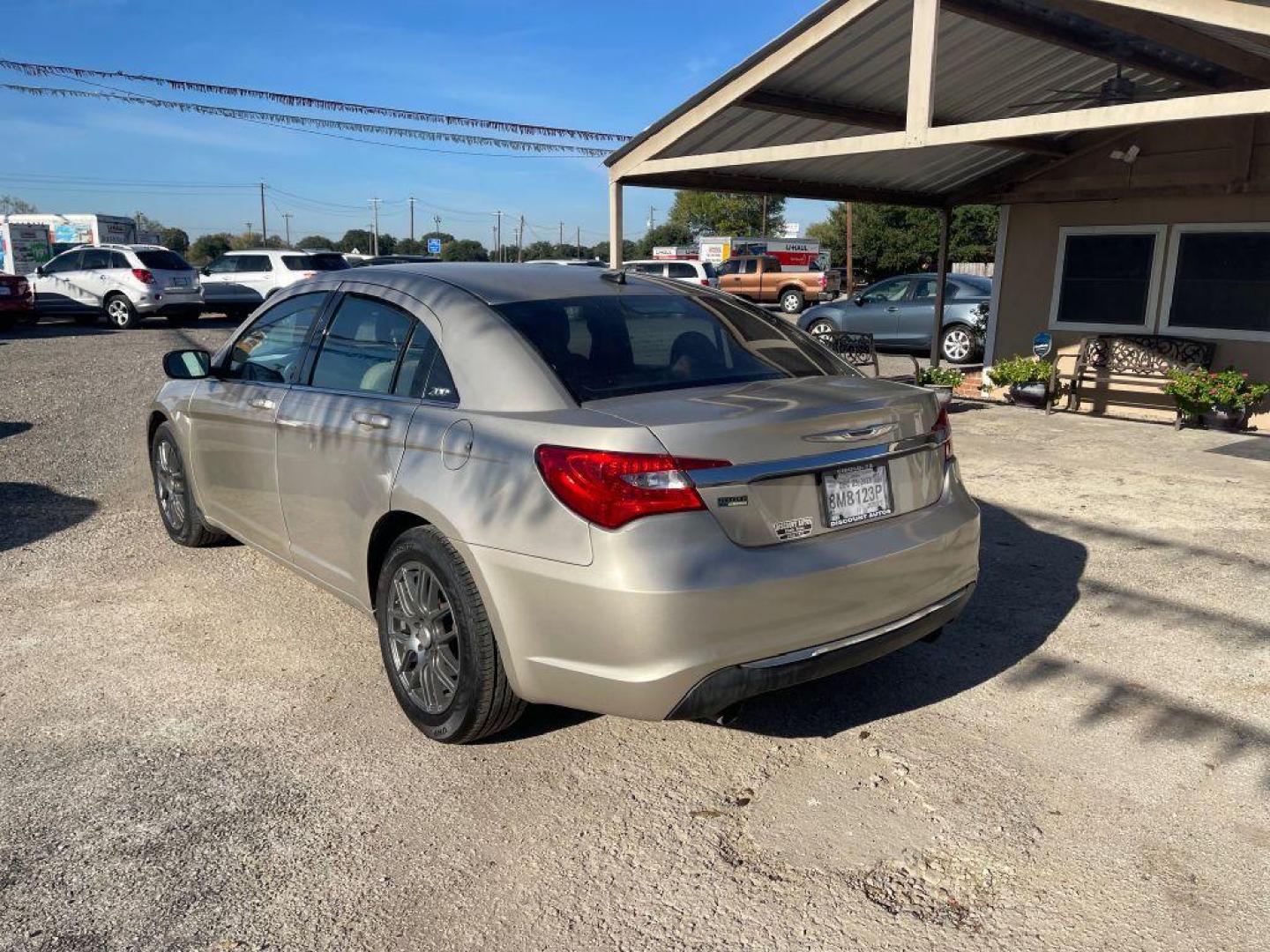 2014 GOLD CHRYSLER 200 LX (1C3CCBAG1EN) with an 3.6L engine, Automatic transmission, located at 124 Elm St., Cibolo, TX, 78108, (210) 658-3118, 29.559427, -98.232384 - Photo#1