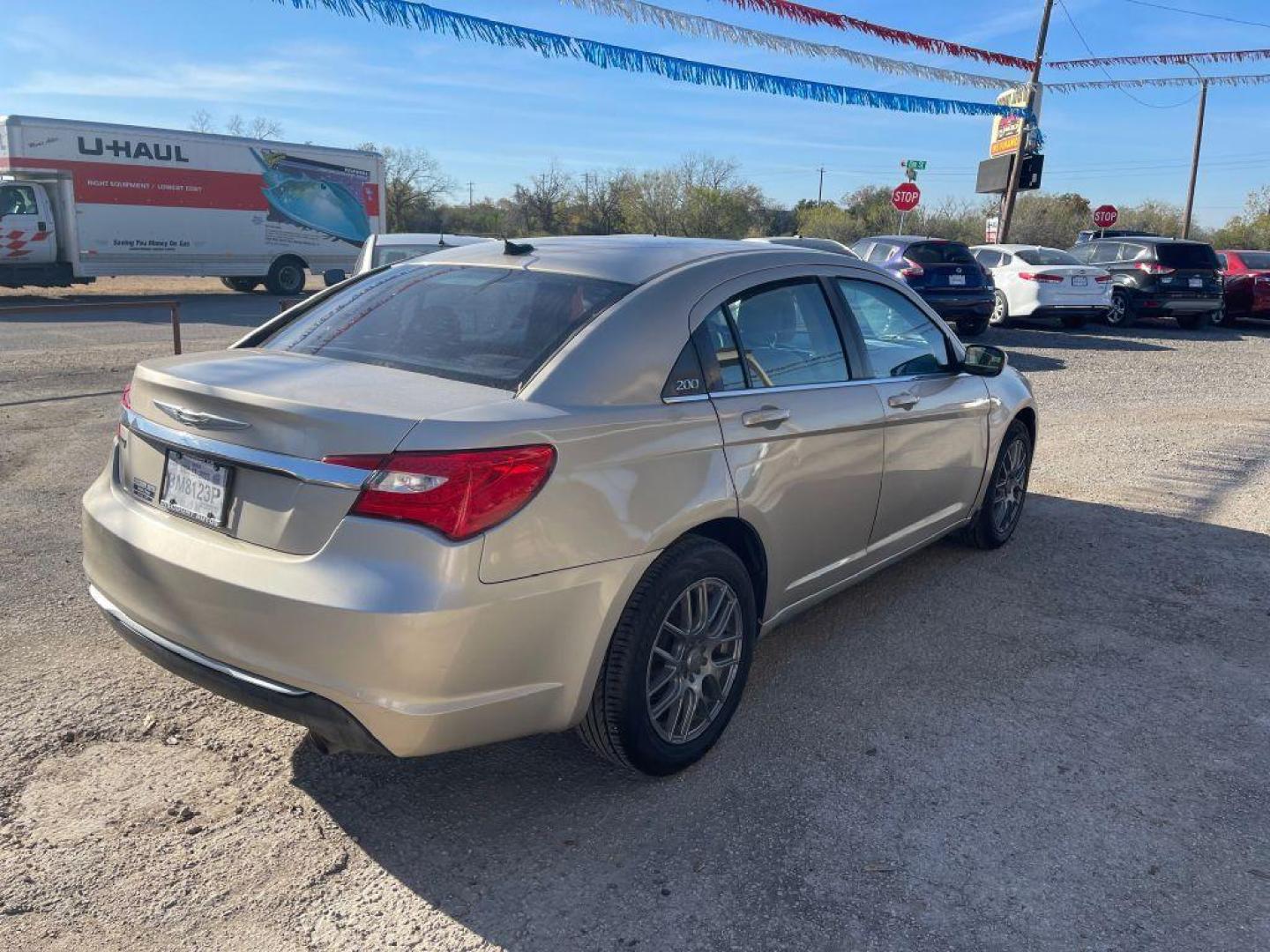 2014 GOLD CHRYSLER 200 LX (1C3CCBAG1EN) with an 3.6L engine, Automatic transmission, located at 124 Elm St., Cibolo, TX, 78108, (210) 658-3118, 29.559427, -98.232384 - Photo#2