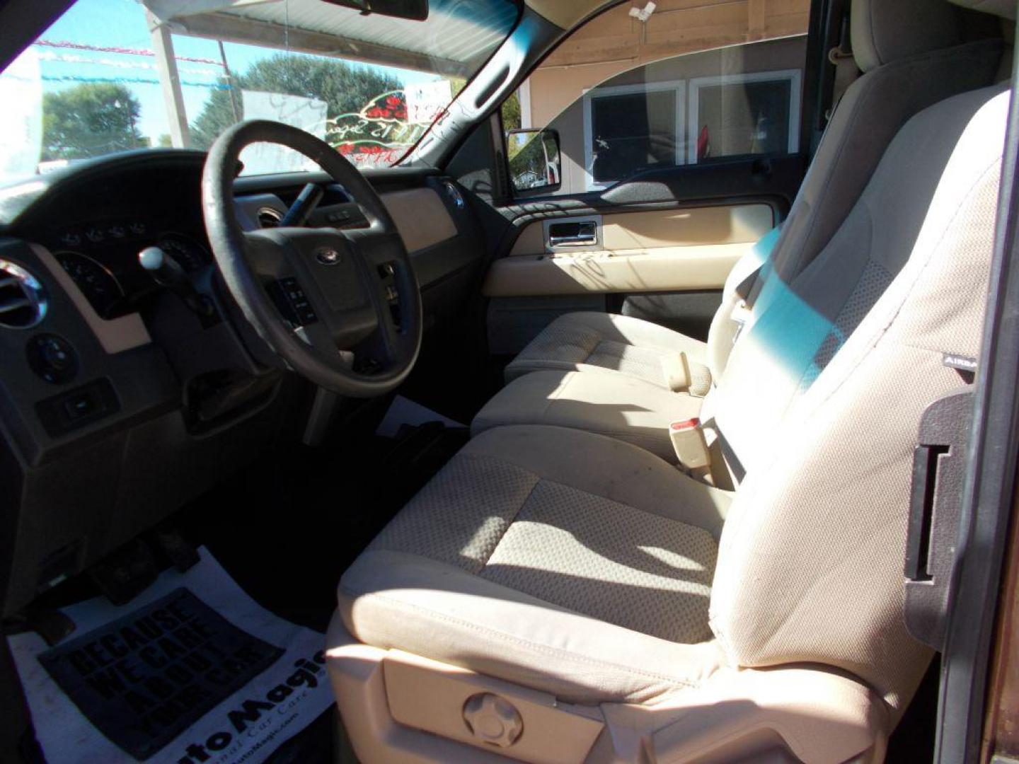 2011 BROWN FORD F150 SUPER CAB (1FTEX1CMXBF) with an 3.7L engine, Automatic transmission, located at 124 Elm St., Cibolo, TX, 78108, (210) 658-3118, 29.559427, -98.232384 - www.discountautoscibolo.com TEXT 210-900-3118 35 MONTHLY PAYMENTS OF $315 WITH $1495 DOWN AND FINAL ODD PAYMENT OF $122.46 W/FIRST PAYMENT DUE 30 DAYS FROM DATE OF SALE. ** NO WARRANTY, SOLD AS IS ** 36 MO'S TERM W/ 22.49 APR and TITLE TRANSFER FEE OF $195 DUE TWO WEEKS AF - Photo#1