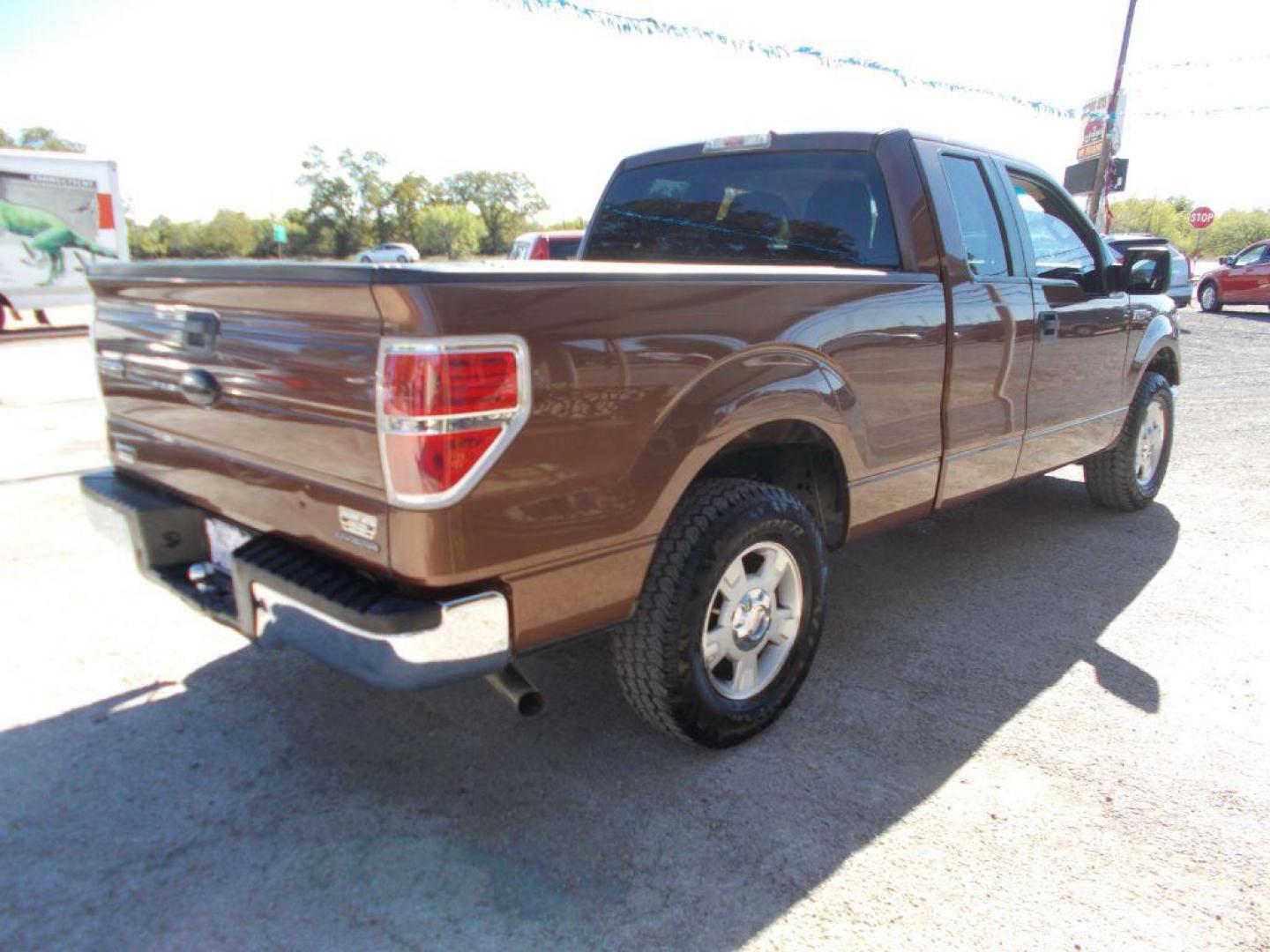 2011 BROWN FORD F150 SUPER CAB (1FTEX1CMXBF) with an 3.7L engine, Automatic transmission, located at 124 Elm St., Cibolo, TX, 78108, (210) 658-3118, 29.559427, -98.232384 - www.discountautoscibolo.com TEXT 210-900-3118 35 MONTHLY PAYMENTS OF $315 WITH $1495 DOWN AND FINAL ODD PAYMENT OF $122.46 W/FIRST PAYMENT DUE 30 DAYS FROM DATE OF SALE. ** NO WARRANTY, SOLD AS IS ** 36 MO'S TERM W/ 22.49 APR and TITLE TRANSFER FEE OF $195 DUE TWO WEEKS AF - Photo#4