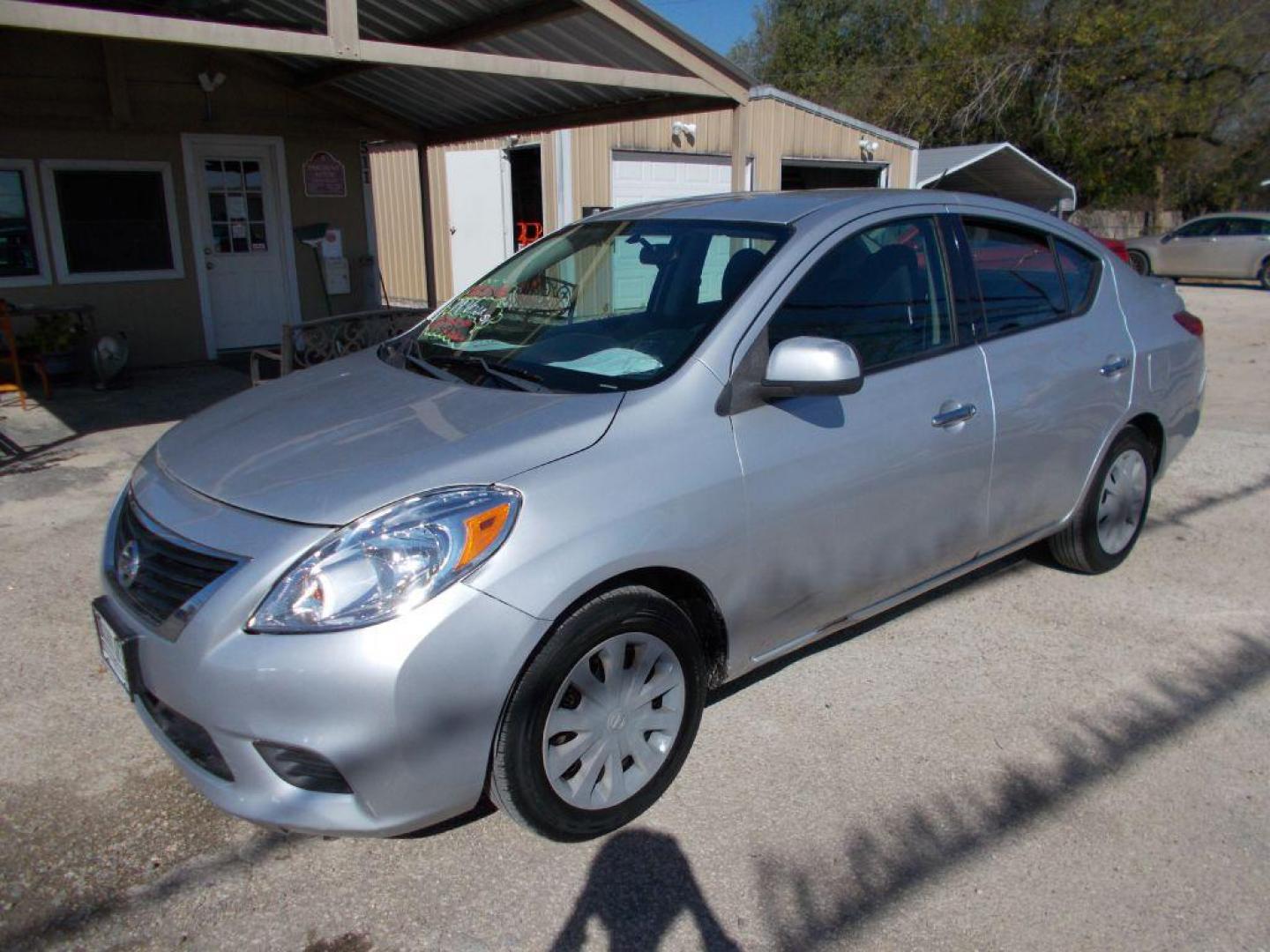 2014 SILVER NISSAN VERSA S (3N1CN7APXEL) with an 1.6L engine, Continuously Variable transmission, located at 124 Elm St., Cibolo, TX, 78108, (210) 658-3118, 29.559427, -98.232384 - www.discountautoscibolo.com TEXT QUESTIONS TO 210-900-3118 35 MONTHLY PAYMENTS OF $230 WITH $1495 DOWN AND FINAL ODD PAYMENT OF $187.35 W/FIRST PAYMENT DUE 30 DAYS FROM DATE OF SALE. ** NO WARRANTY, SOLD AS IS ** 36 MO'S TERM W/ 22.40 APR and TITLE TRANSFER FEE OF $195 DU - Photo#0