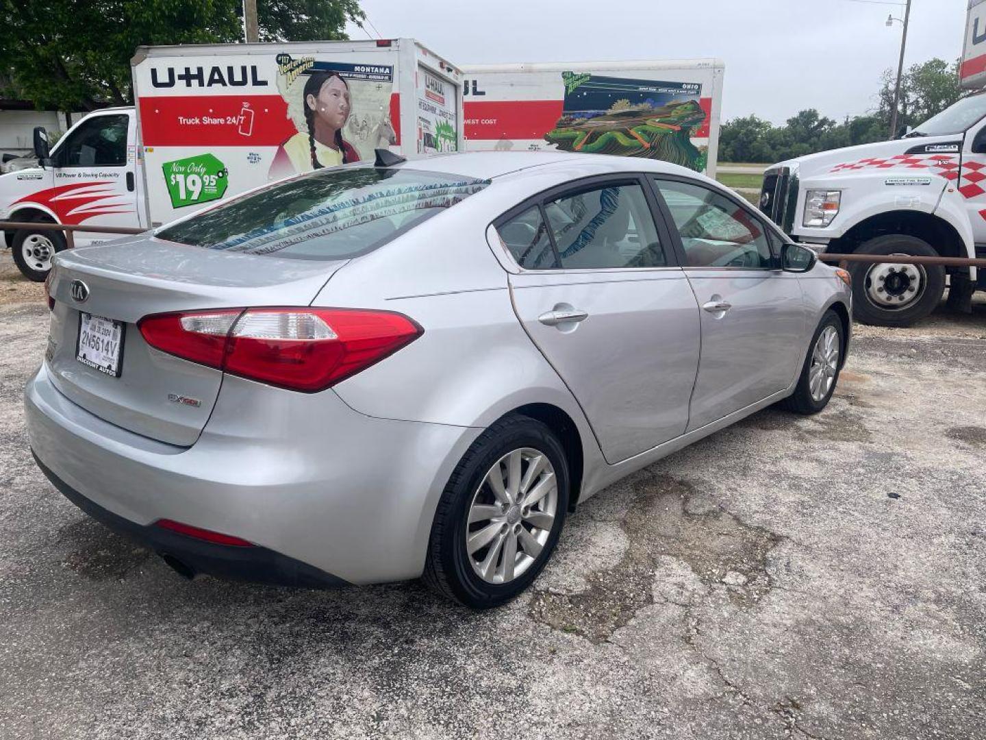 2014 SILVER KIA FORTE EX (KNAFX4A84E5) with an 2.0L engine, Automatic transmission, located at 124 Elm St., Cibolo, TX, 78108, (210) 658-3118, 29.559427, -98.232384 - www.discountautoscibolo.com TEXT QUESTIONS TO 210-900-3118 35 MONTHLY PAYMENTS OF $300 WITH $1895 DOWN AND FINAL ODD PAYMENT OF $21.45 W/FIRST PAYMENT DUE 30 DAYS FROM DATE OF SALE. FEATURES: BACK UP CAMERA ** NO WARRANTY, SOLD AS IS ** 36 MO'S TERM W/ 22.40 APR and TITLE - Photo#5