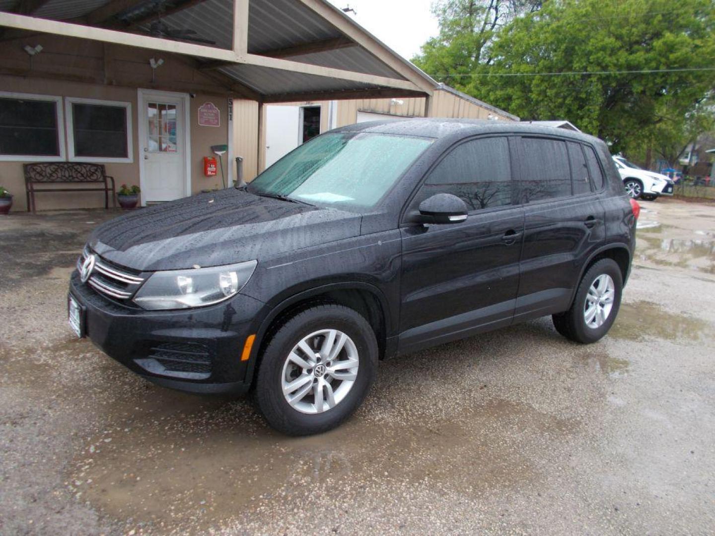 2013 BLACK VOLKSWAGEN TIGUAN S (WVGAV3AX4DW) with an 2.0L engine, Automatic transmission, located at 124 Elm St., Cibolo, TX, 78108, (210) 658-3118, 29.559427, -98.232384 - www.discountautoscibolo.com TEXT QUESTIONS TO 210-900-3118 41 MONTHLY PAYMENTS OF $320 WITH $1495 DOWN AND FINAL ODD PAYMENT OF $147.25 W/FIRST PAYMENT DUE 30 DAYS FROM DATE OF SALE. ** NO WARRANTY, SOLD AS IS ** 42 MO'S TERM W/ 22.54 APR and TITLE TRANSFER FEE OF $195 DUE TW - Photo#0